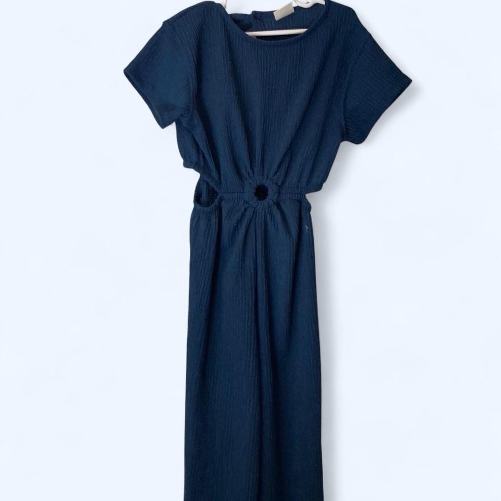 Navy blue jumpsuit with keyhole middle and open sides back slit as well girls 9